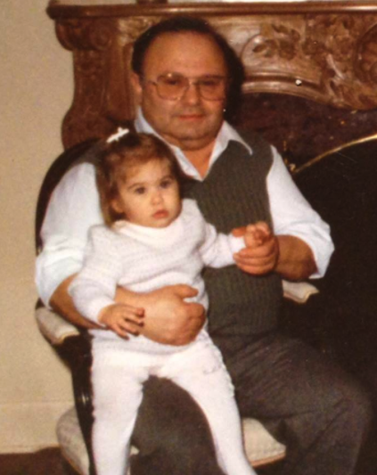 Cristina as a toddler with her Dad, Carmen.