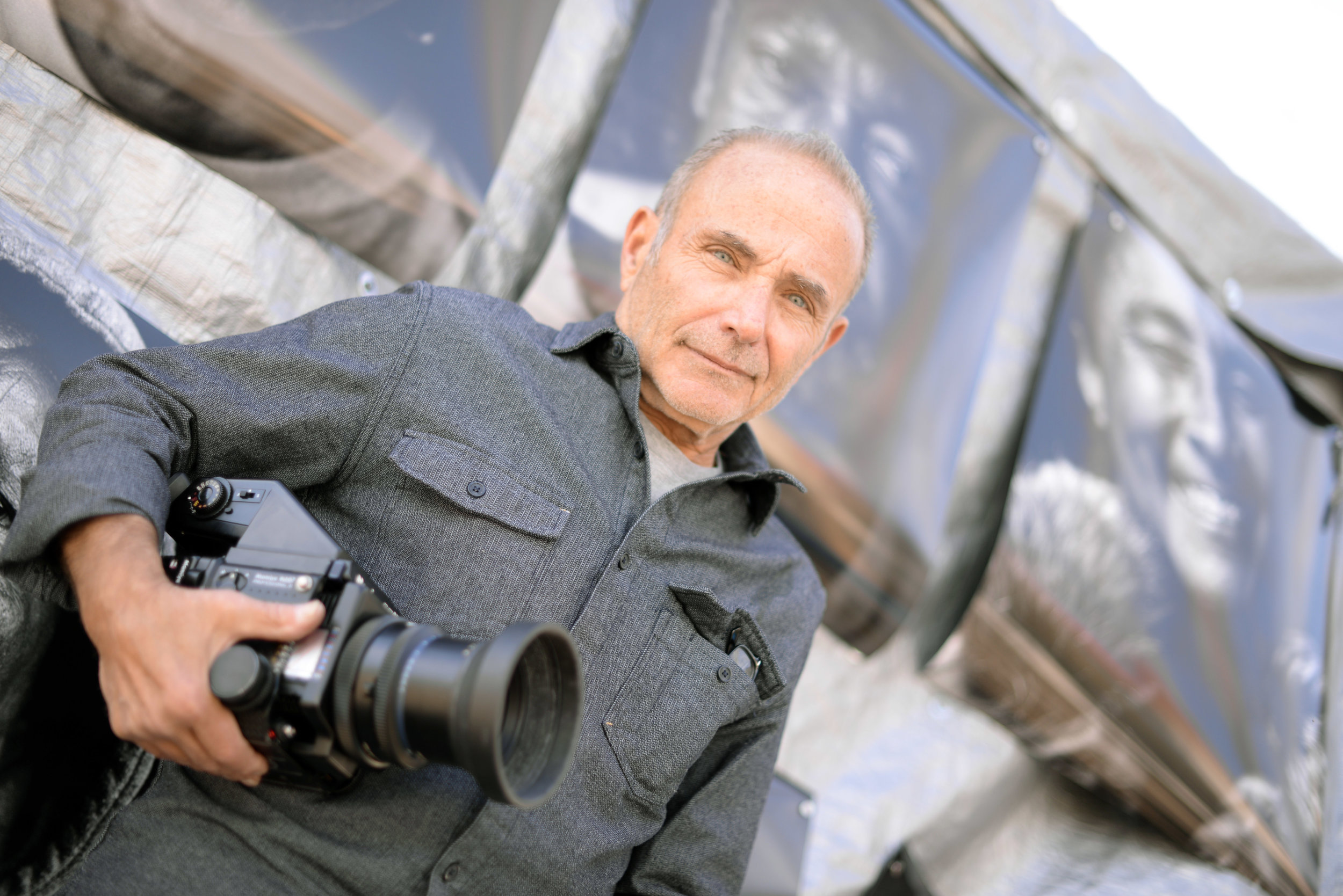 Orie Rutchik outside his mobile portrait studio near the Berkeley Drop-In Center on Adeline Street at Harmon. Photo: Chris Polydoroff Click here to watch video by Chris Polydoroff about the Berkeley Portrait Project.