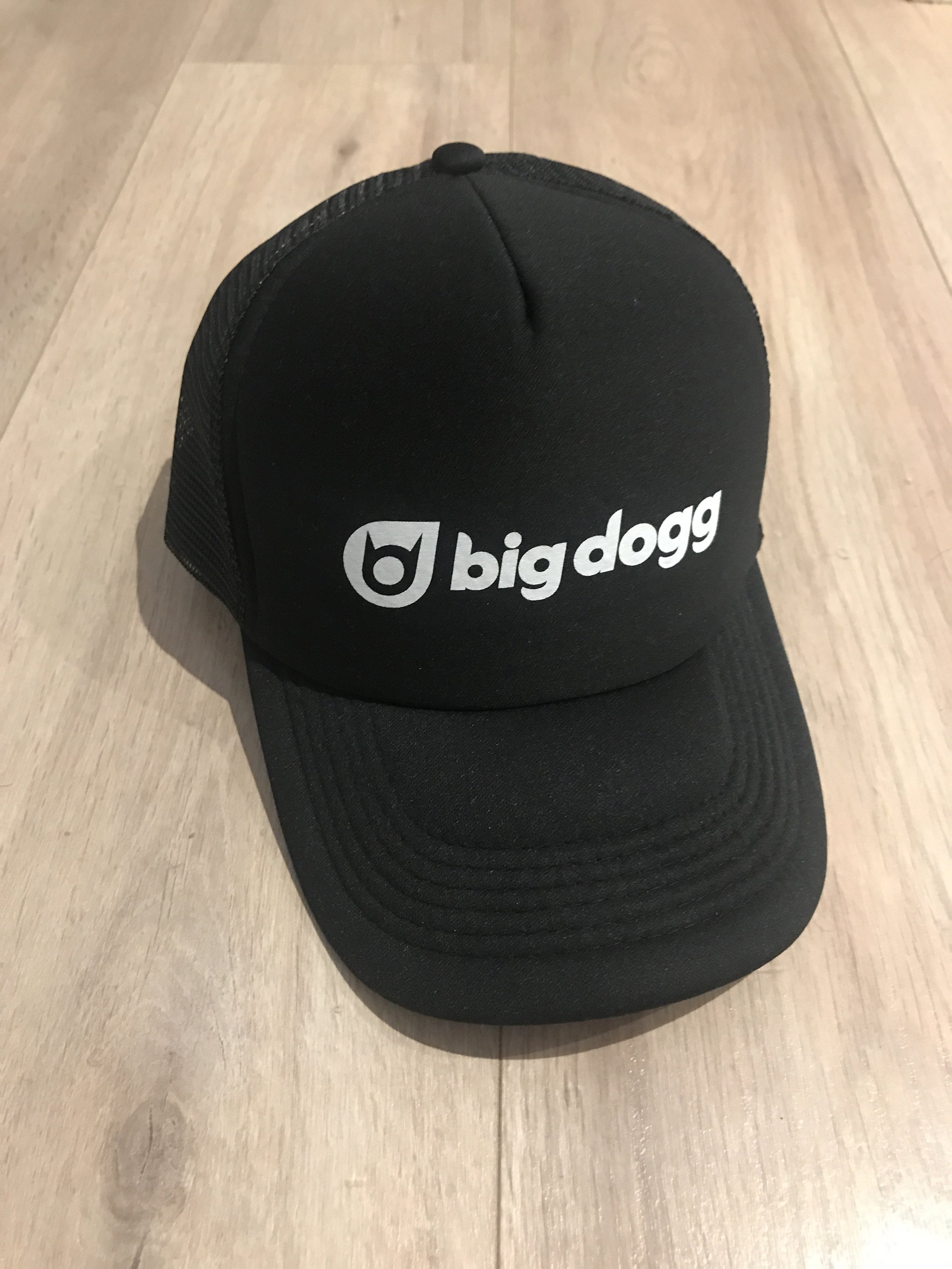 Black logo trucker hat