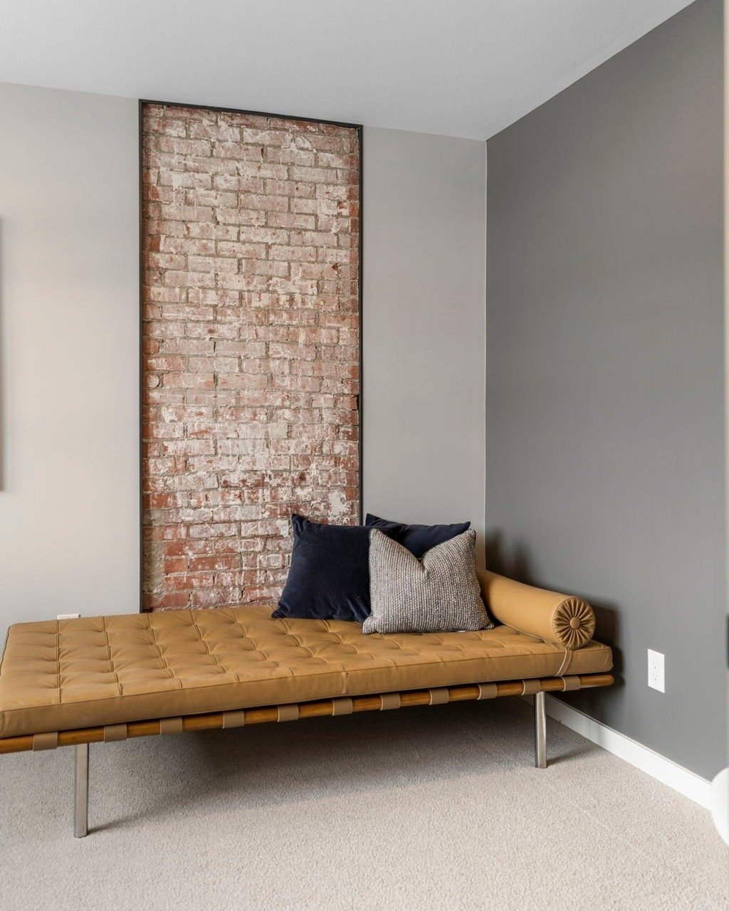 From &ldquo;Dead Space&rdquo; to Design Moment!

This cozy corner proves that intentional layering of textures and tones can turn even the most overlooked nook into a standout feature. The contrast of the weathered brick with smooth leather, the play