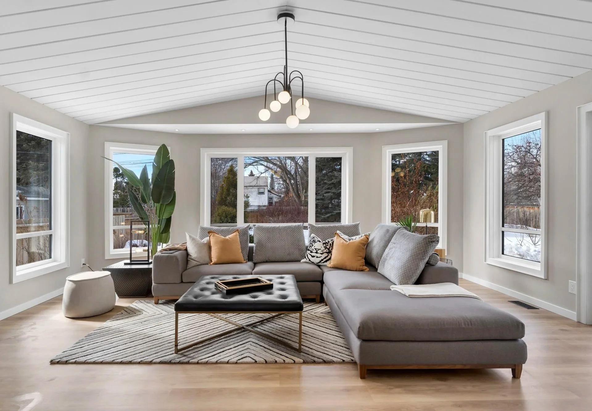 Mid-century modern living room in the Centric home renovation, Grosvenor Park, Saskatoon, designed by Metric Design