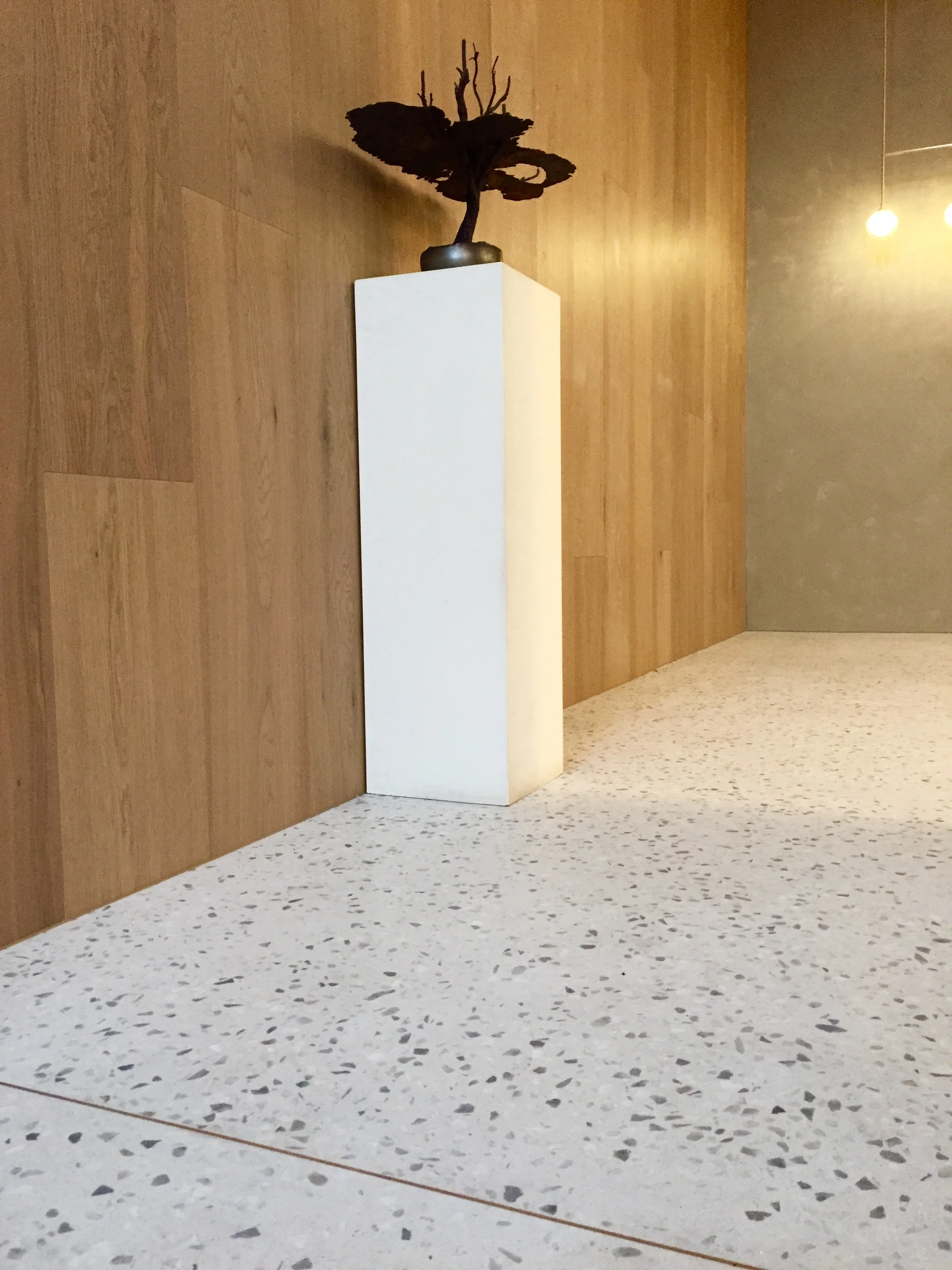 Traditional concrete terrazzo in an incredibly thin real concrete overlay Covet