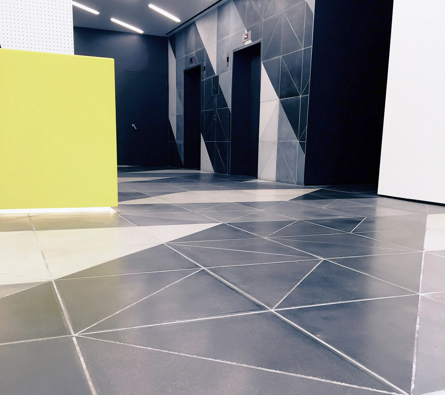 Interior concrete Tile Commercial lobby Laguns Smooth Custom triangle.jpg