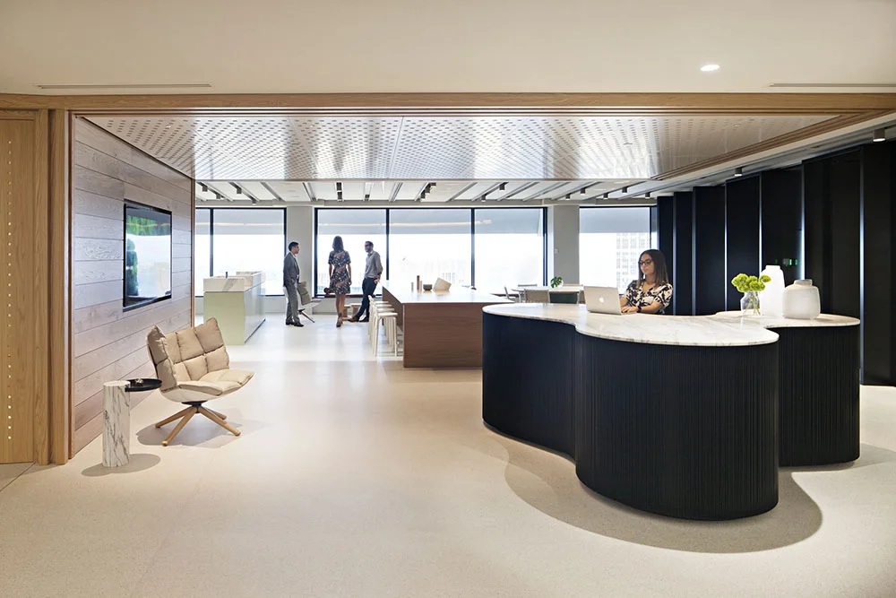 Unispace-GeorgeSt-Concrete-Overlay-Pietra-Dove_Reception.jpg