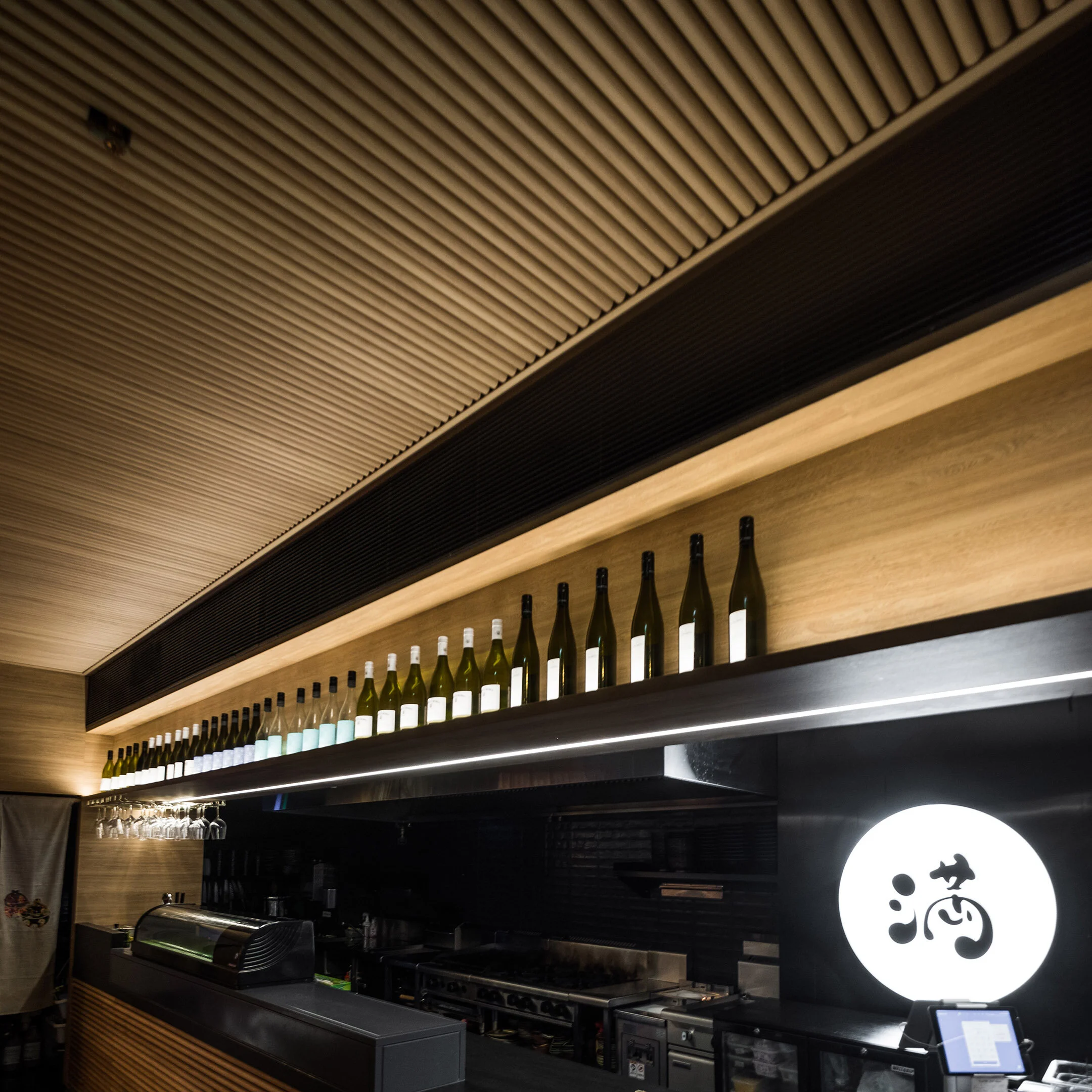 Timber look battens transform the interior of Sydney’s Izakaya Michi