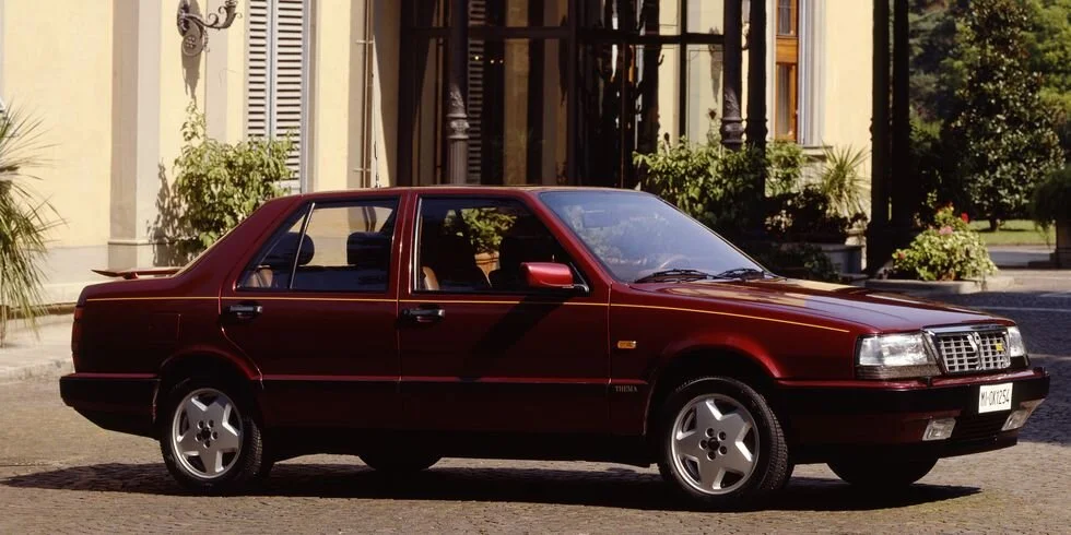   Lancia Thema 8.32 - How to symbolise the history of Ferrari on your performance saloon? Yellow pinstripe!  