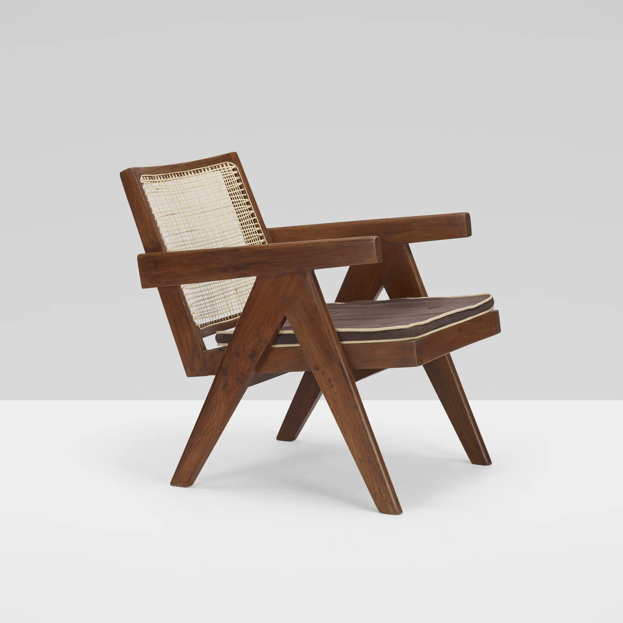 Pierre Jeanneret Easy chair from the administrative buildings of Chandigarh. Hand-stenciled marks. Dimensions : H 67 x W 54 x D 77 cm circa Date of manufacture : 1955 circa Provenance : Administrative Buildings, Chandigarh INQUIRE