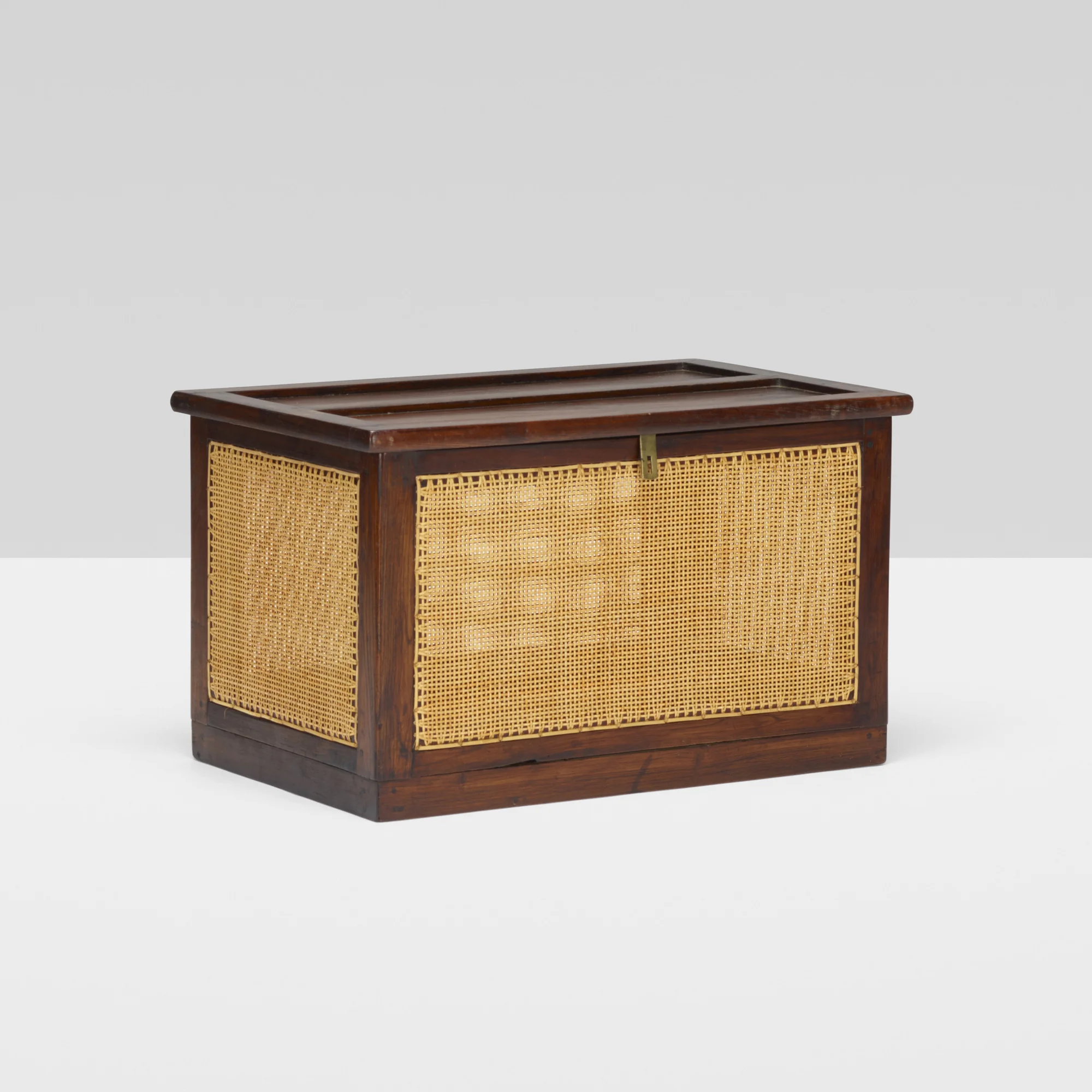 Pierre Jeanneret Linen chest from the M.L.A. Flats building in Chandigarh. Rare piece in wood and original cane. Hand-stenciled marks. Dimensions : H 48 x W 72 x D 43cm Date of manufacture : 1955 circa Provenance : M.L.A. Flats building, Chandigarh; Private Collection, France INQUIRE