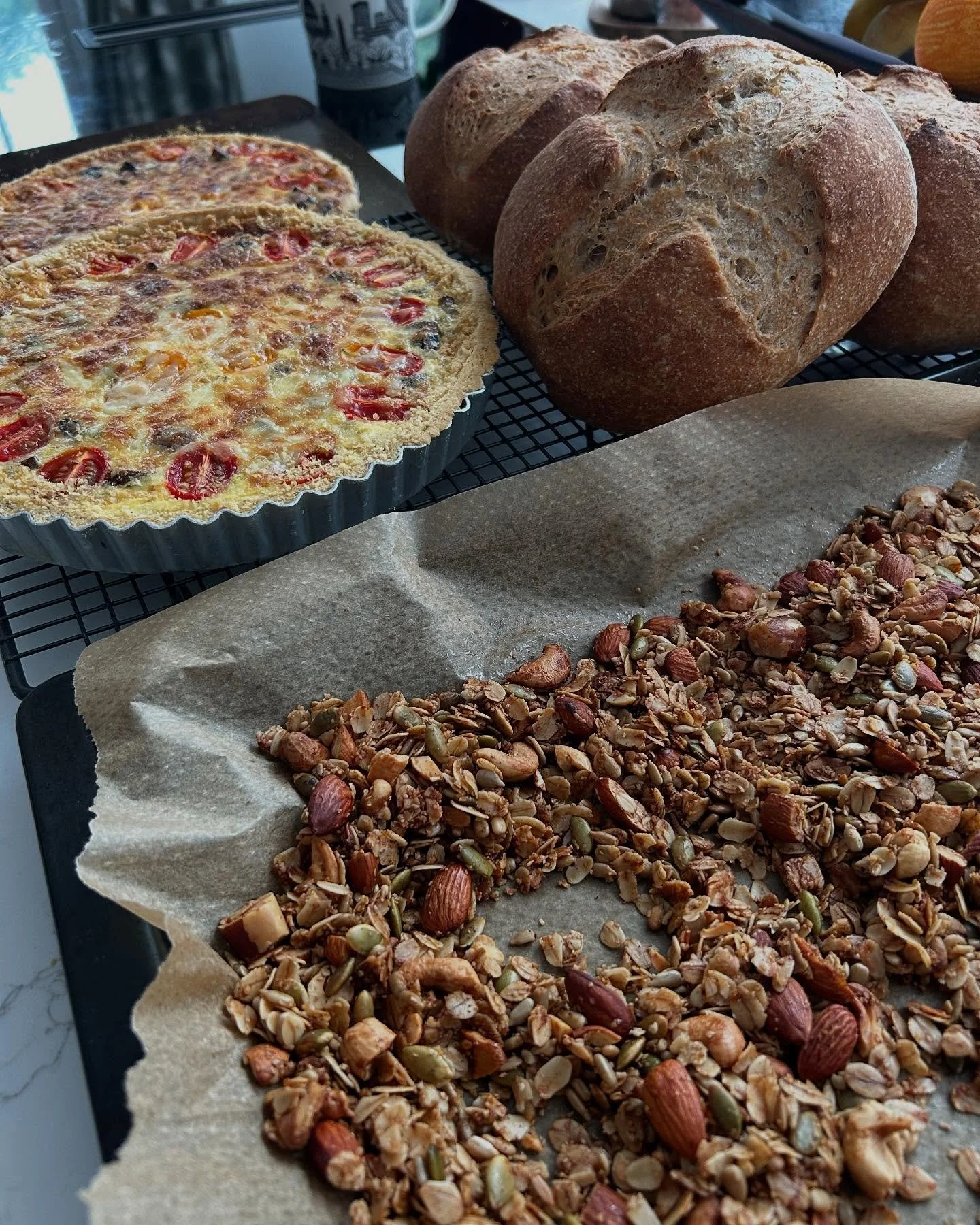 🌿 Quiet Saturday means the perfect excuse to bake 🍞✨

* Wholemeal sourdough loaves (recipe from @mabakerbakes 🌾)
* Leek &amp; mushroom quiche (one for supper, one tucked away in the freezer 🥧)
* Crunchy, nutty high-protein granola to keep breakfa