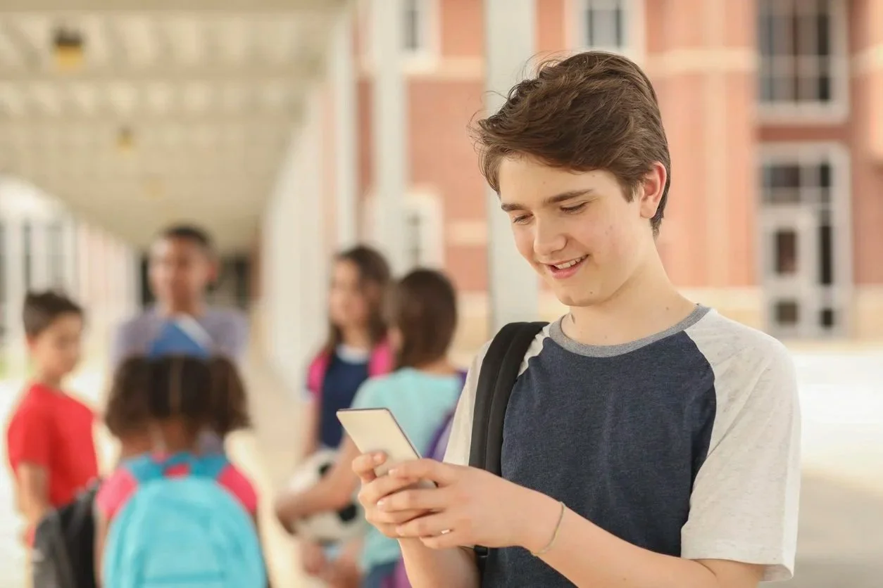 Boy+using+phone.jpg