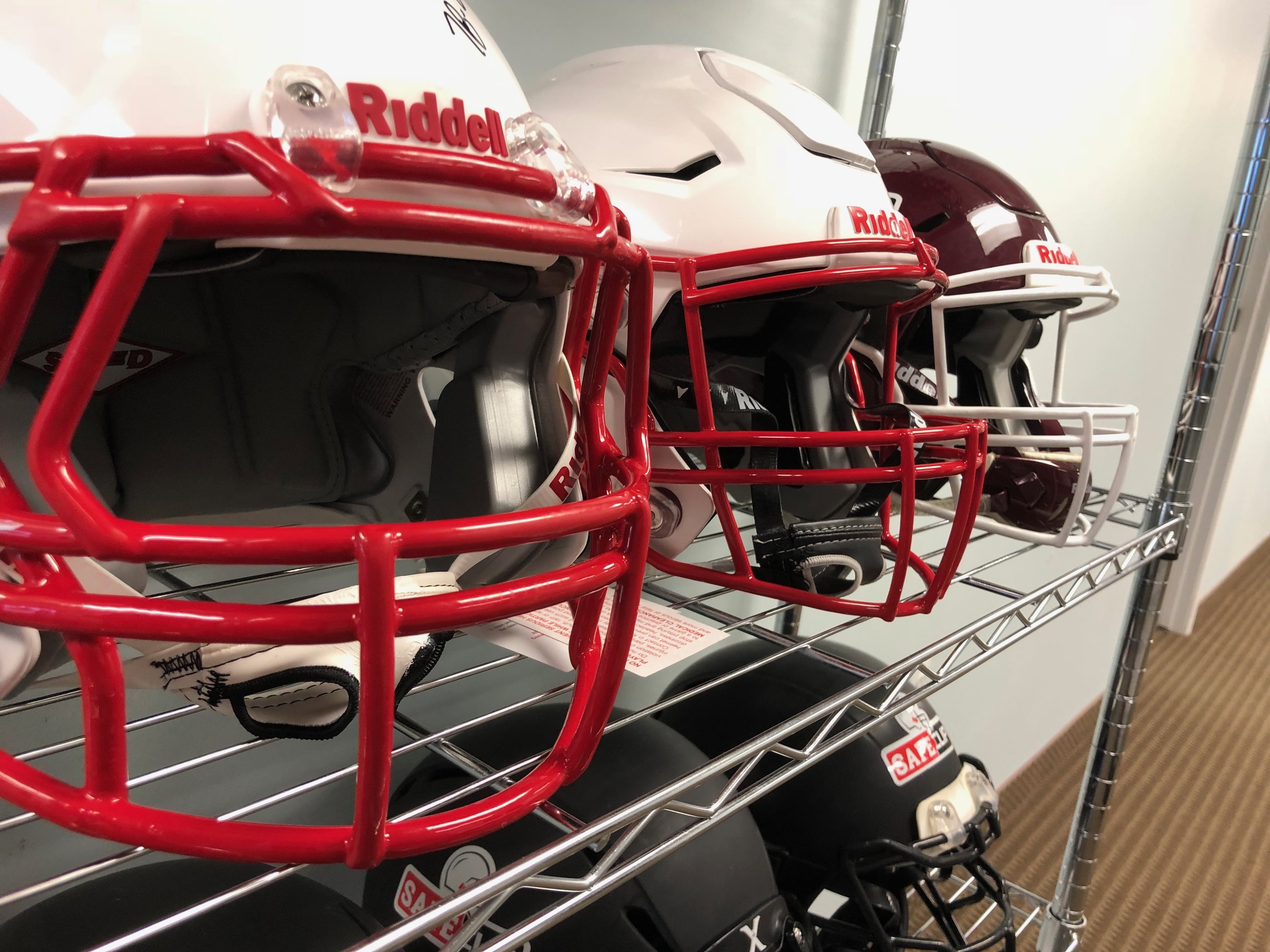 Collection of SAFEClip helmets used for testing