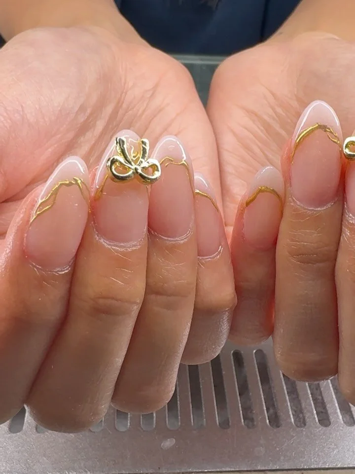 Soft white frenchies and gold accents for a bachelorette weekend! #nails #hamiltonnails