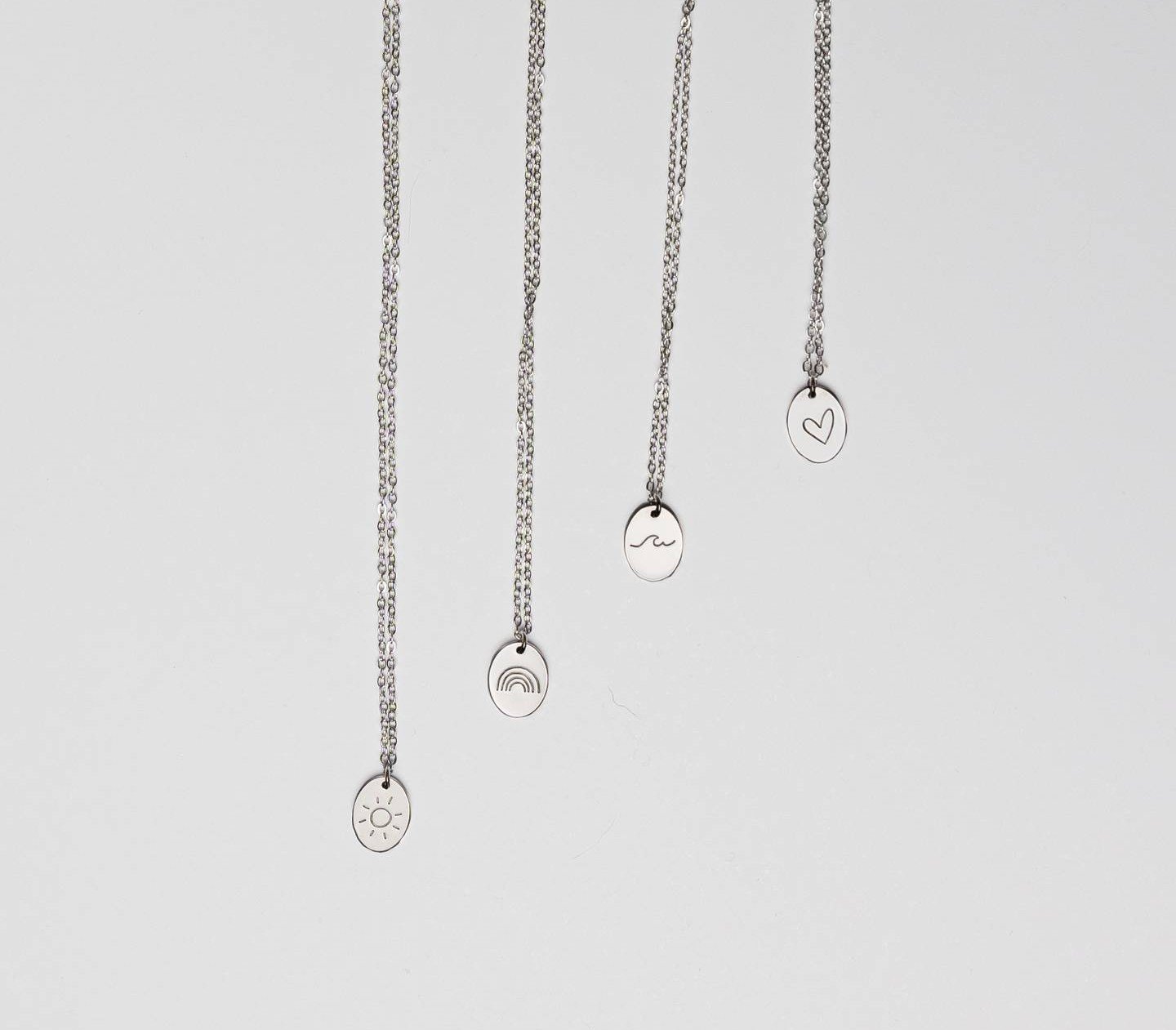 Silver Stamp Necklaces.jpg