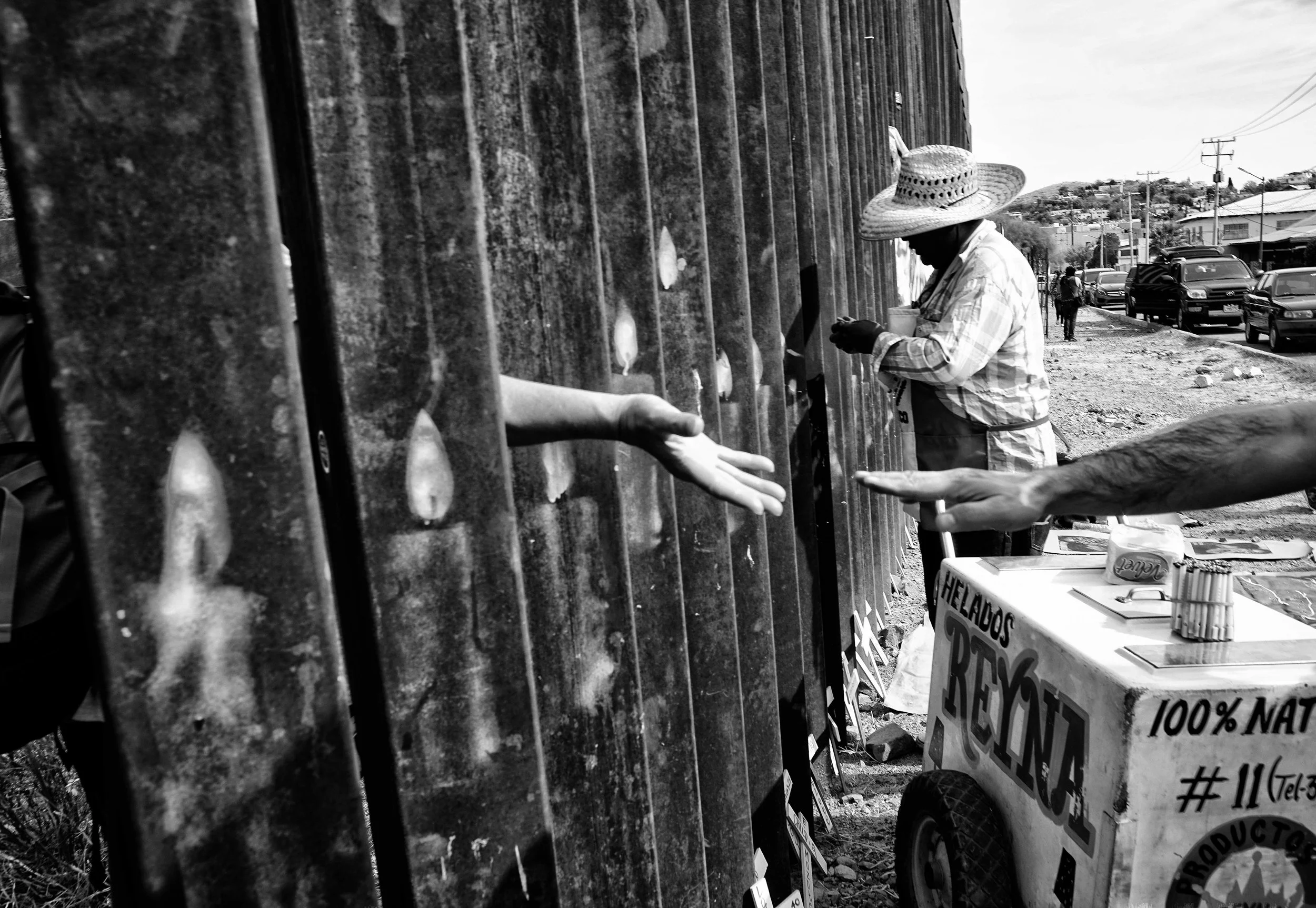 Border handshake. Photo by Chip Thomas.