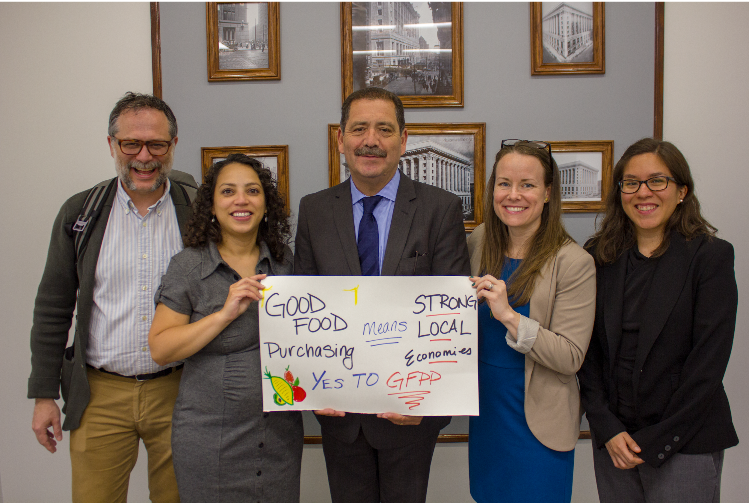 Rodger Cooley, Lilian Jimenez, Cook County Commissioner Jesús “Chuy” García, Christina Bronsing-Lazalde, and Victoria Moreno celebrate the passage of the Good Food Purchasing Resolution by the Cook County Board of Commissioners