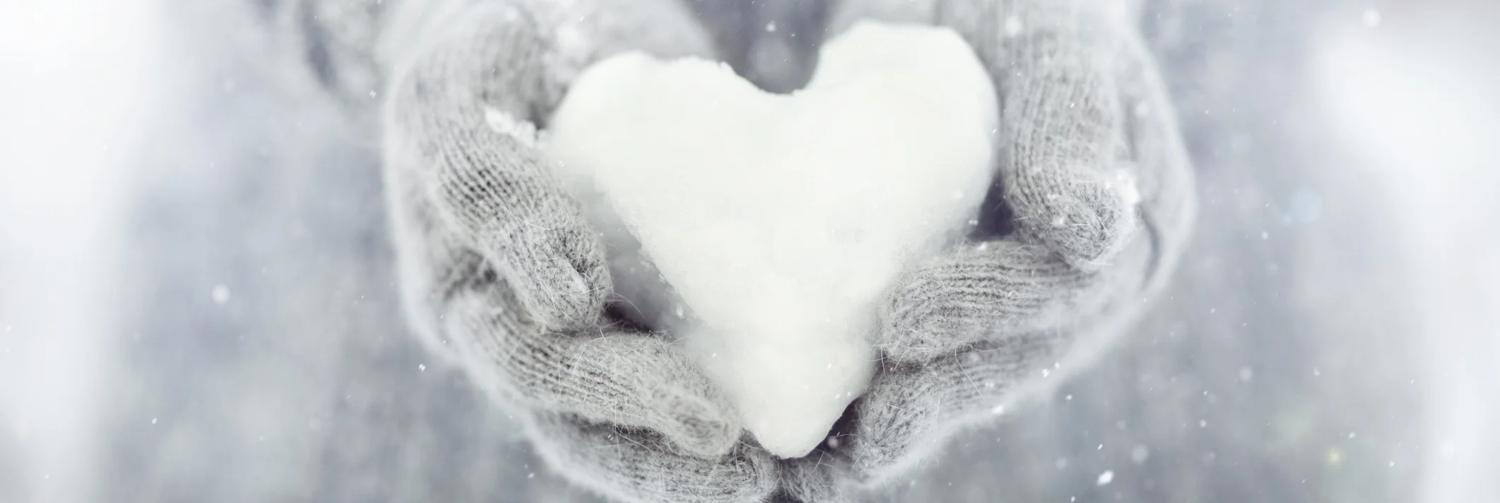 heart-hands-snow-626230140.jpg