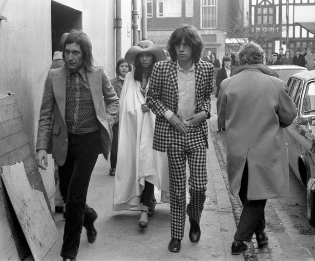 Charlie Watts, Mick Jagger and his girlfriend Bianca De Macias arrive at Coventry Theatre 6th March 1971.jpeg