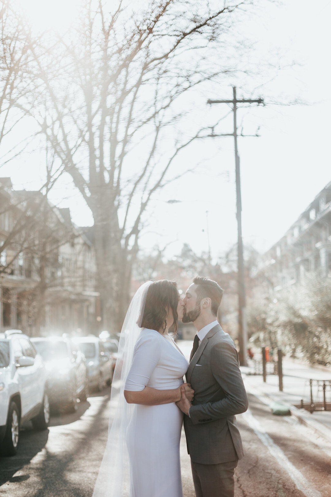 Rachel and Matthew transformed an empty non-profit building where she works into an industrial urban chic wedding in Philadelphia, Pennsylvania. Photographed by Elizabeth Gibbs Photography.