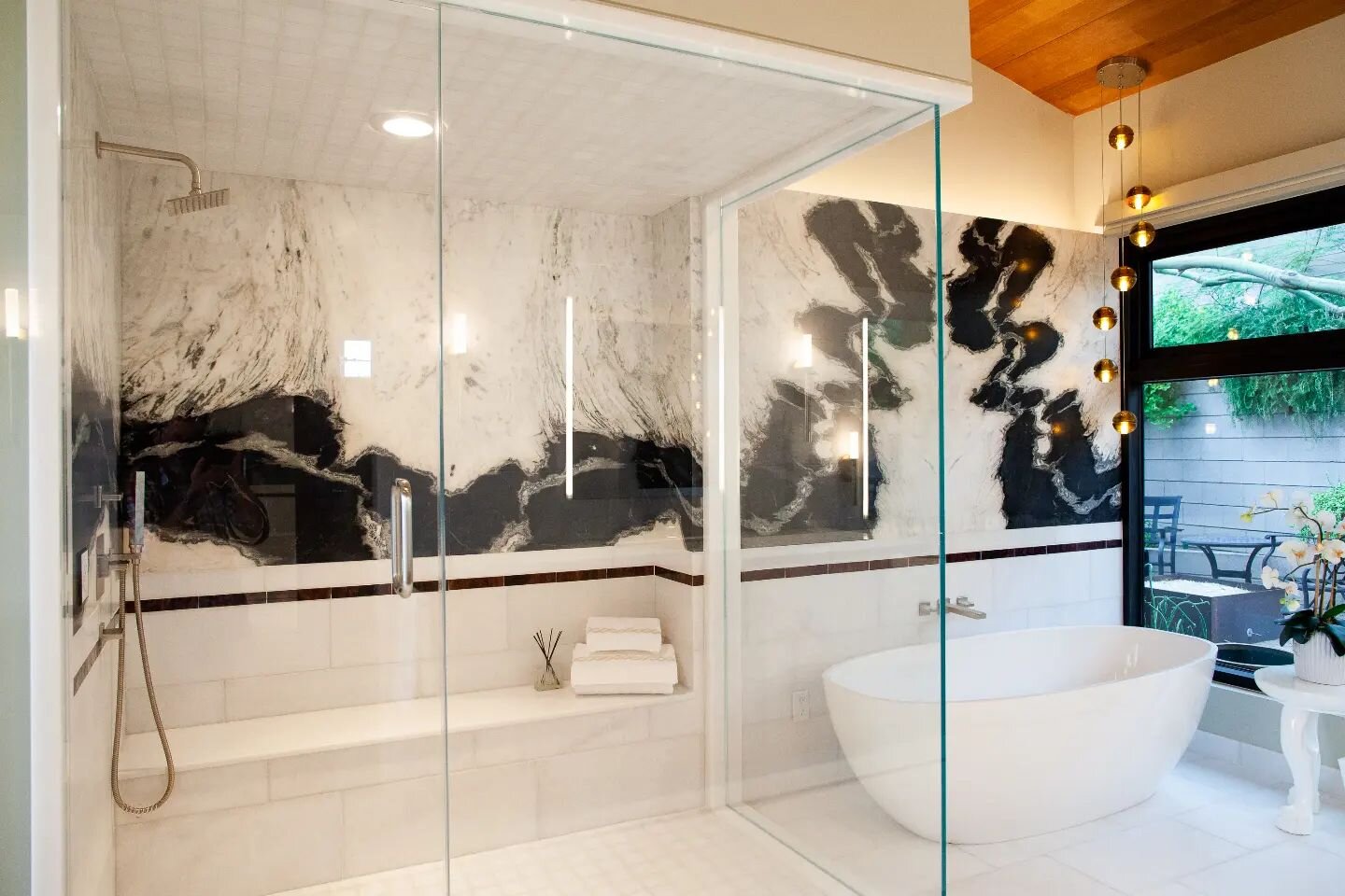 I'm so excited to show you this luxurious bathroom! The architect and my wonderful clients brought me the best challenge - how to keep the existing wood ceiling and cabinets and use these black and white Panda marble and granite slabs. I used matte m