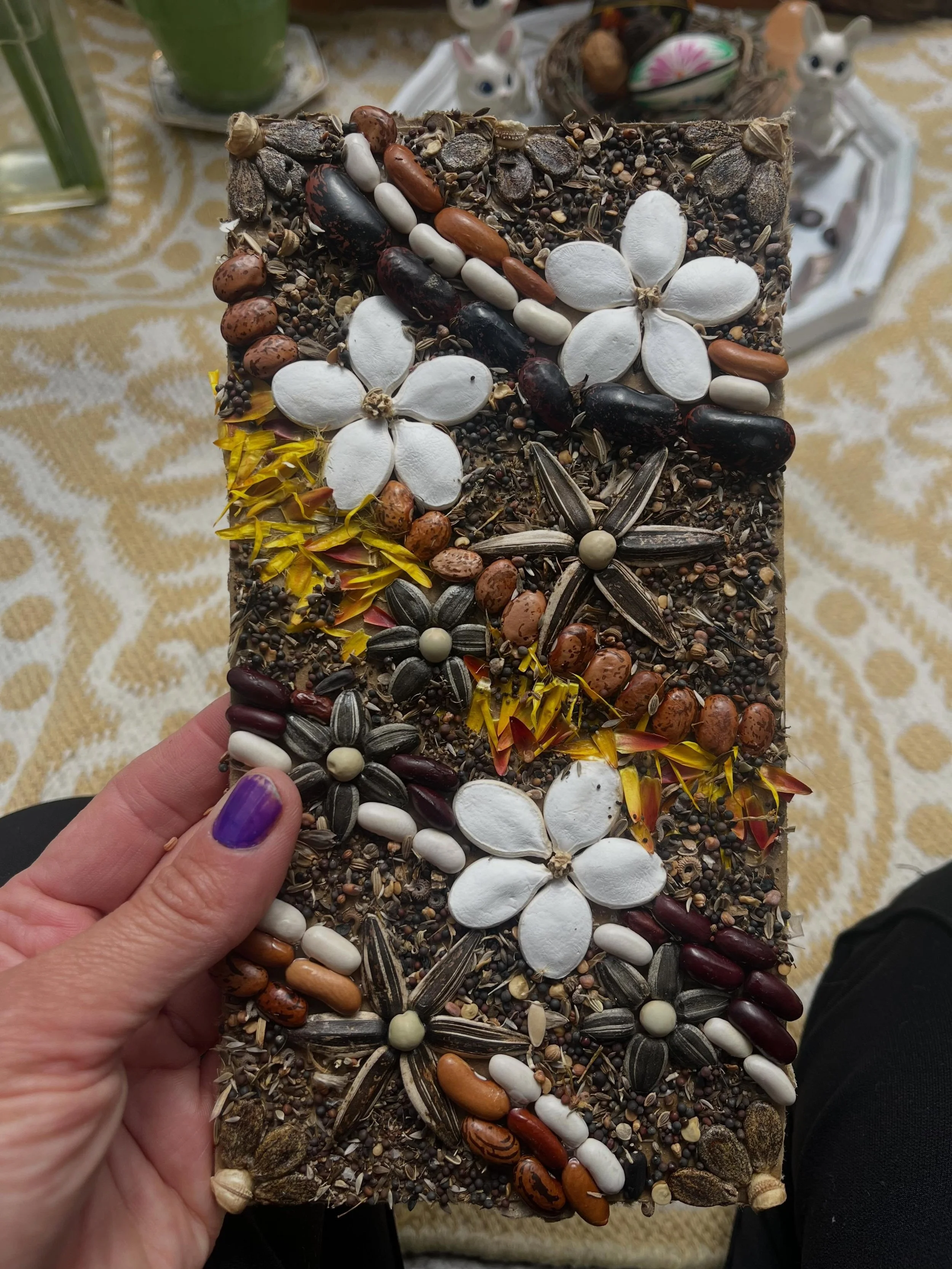 I will often have an activity available for a month at a time that coincides with the season and skills being practiced. This spring I have a giant box of old seeds. Clients could explore the differences of each plant seed or make mosaics. This is th