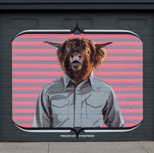 Thievin Stephen. Graffiti of a Bull in a button Down Shirt.