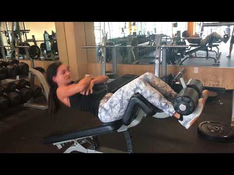 20. Ab decline bench crunch with barbell plate