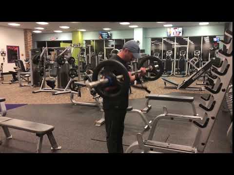 47. Straight bar bicep curls