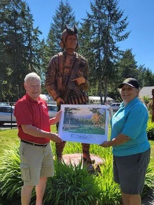 Presentation of Numbered Tom Lynch print of 11th Hole to Traci Williams