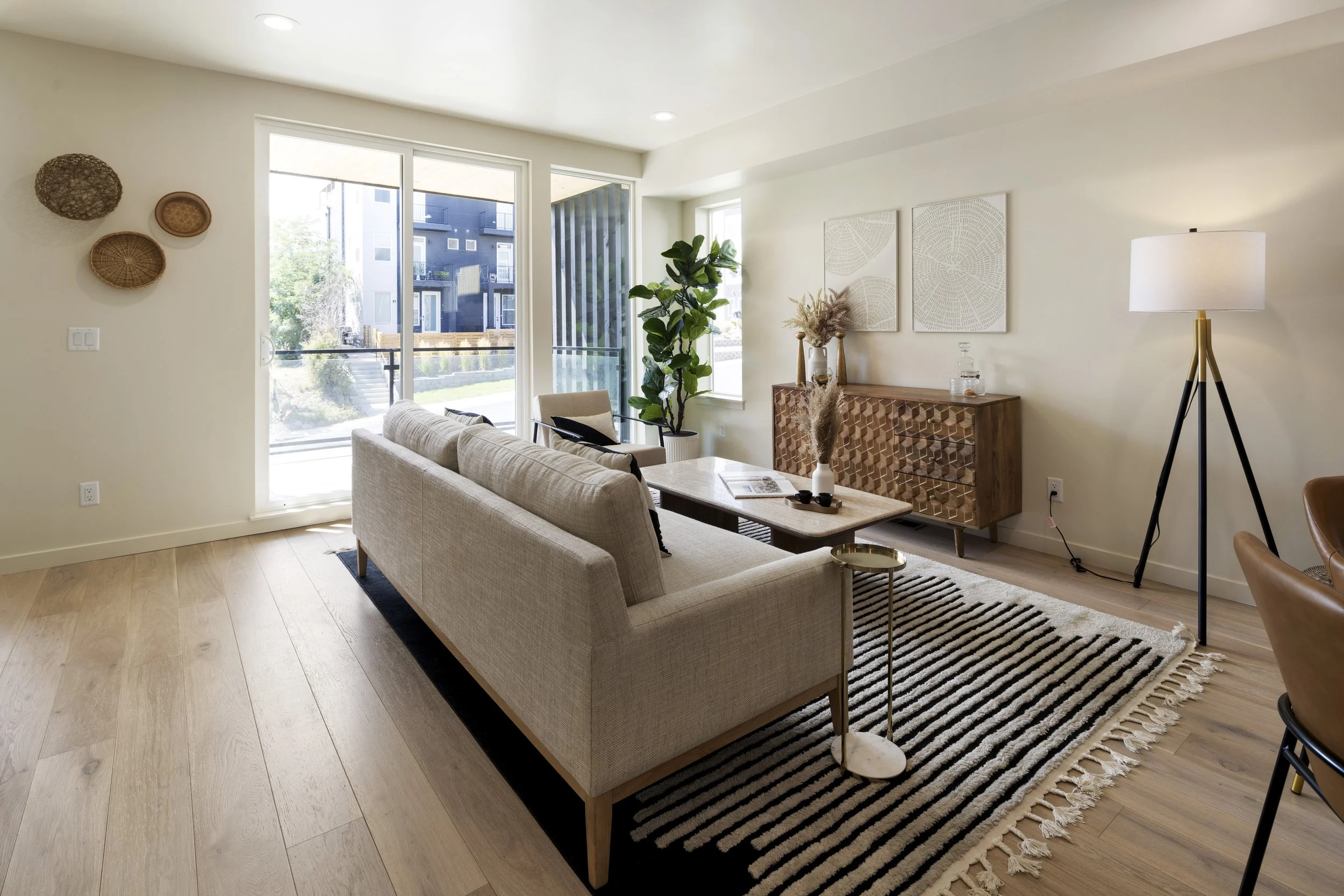 Stuart Residences living room with sliding doors to the patio