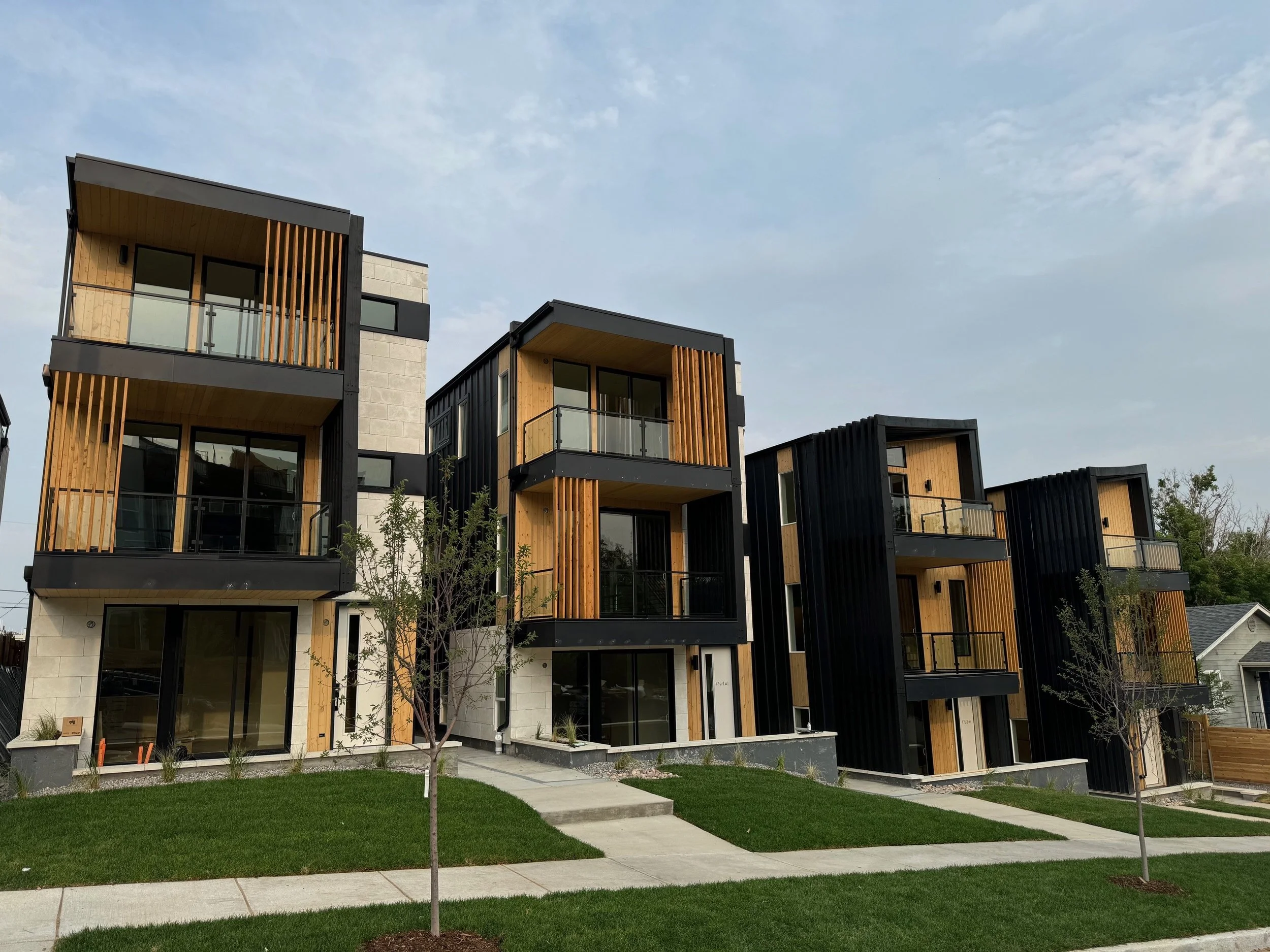 Stuart Residences duplexes with wood slat and metal cladding, Denver