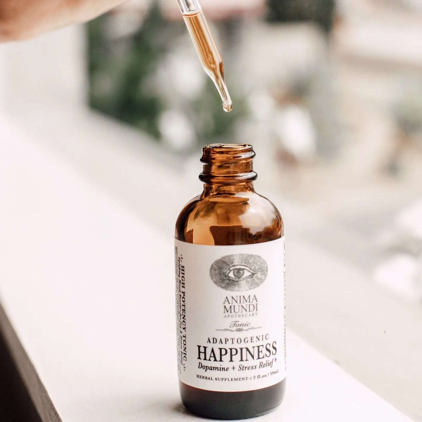 find your inner peace&mdash;one drop at a time. ✨
Anima Mundi&rsquo;s Happiness Tonic is a beloved blend of mood-supportive adaptogens&mdash;mucuna, albizia, ashwagandha, rhodiola, and st. john&rsquo;s wort&mdash;crafted to soothe the nervous system 