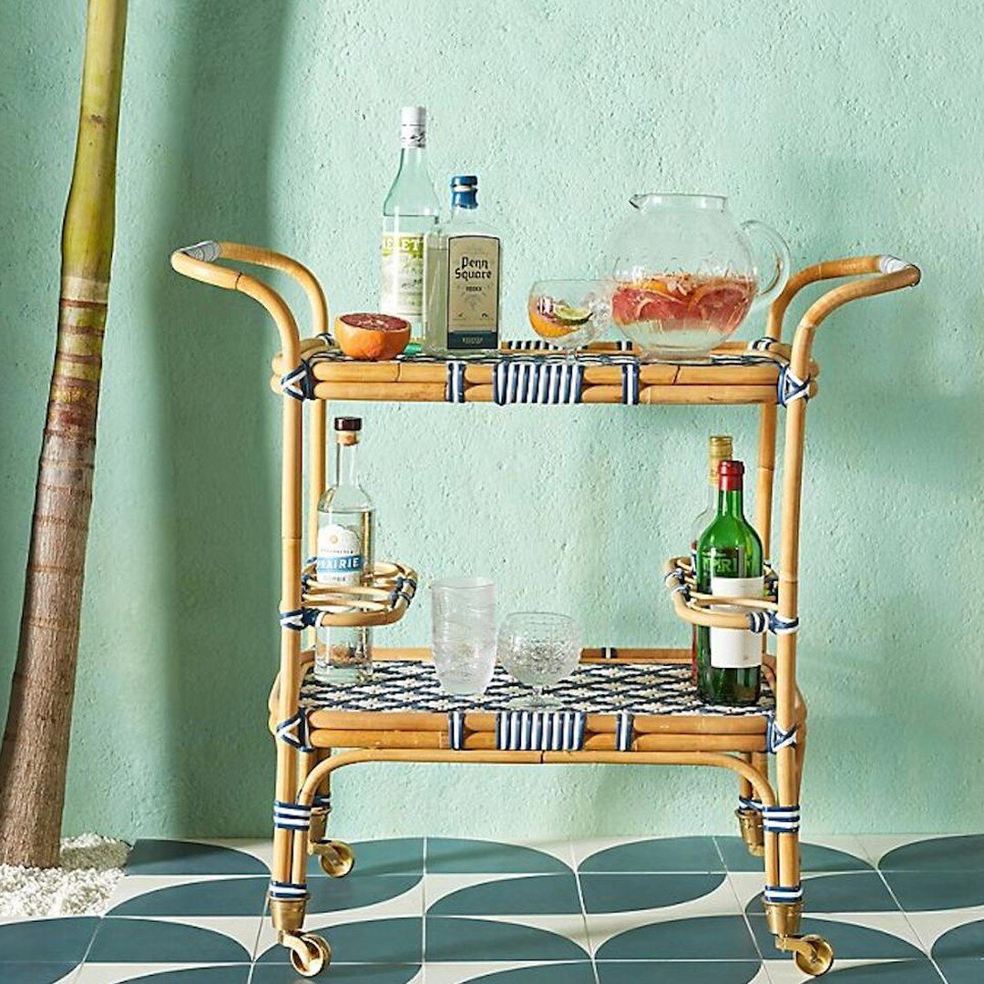 It&rsquo;s the backyard party time of year! Bar carts are a decorative and functional addition for any party. Try styling your bar cart with a bright vase of flowers, and make sure you balance out your bottles and glassware between each level. I love