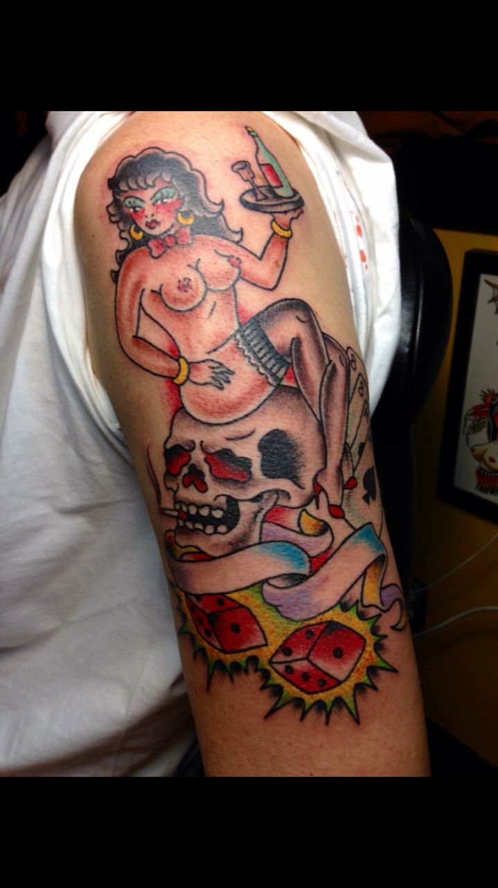 Pin up tattoo with skull, dice and banner by Brian Gattis at Southern Star Tattoo in Atlanta, Georgia