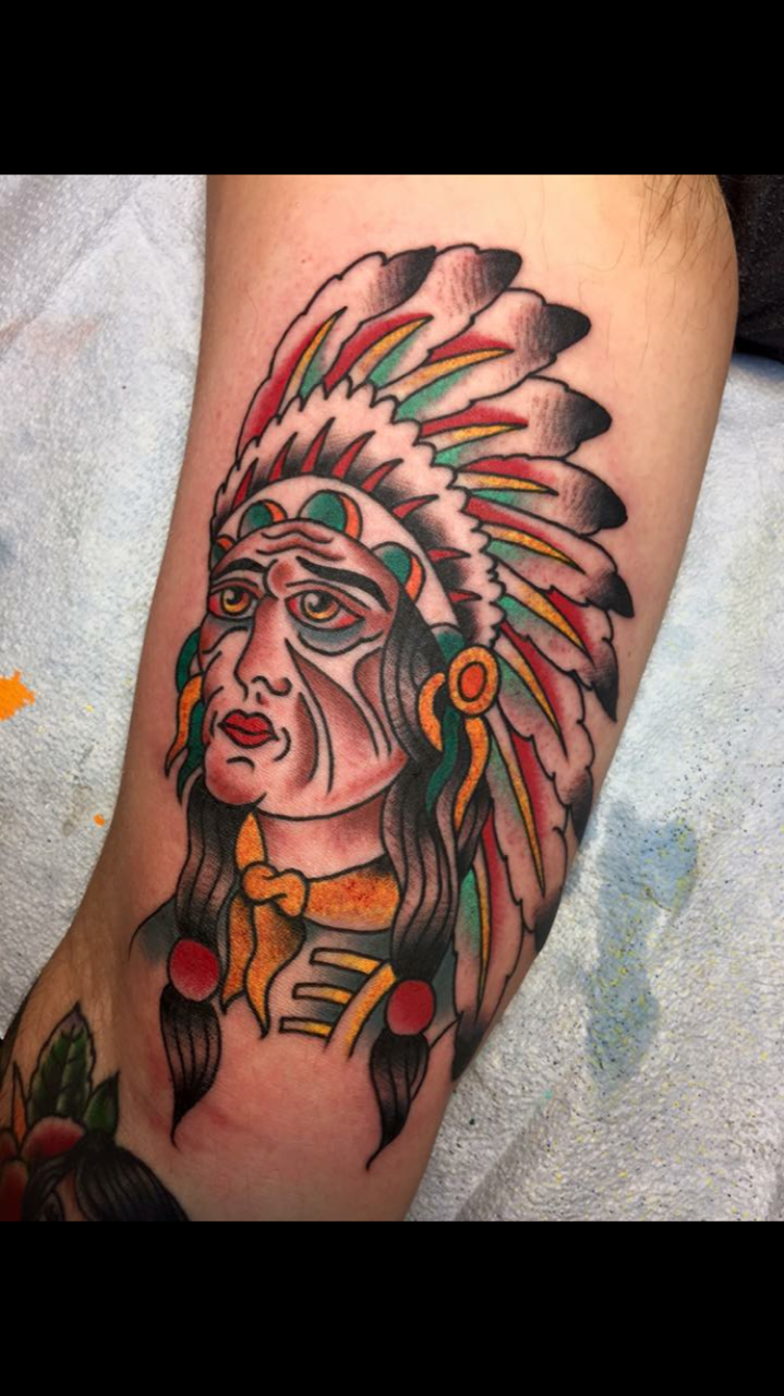 Native American with headdress tattoo by Brian Gattis at Southern Star Tattoo in Atlanta, Georgia