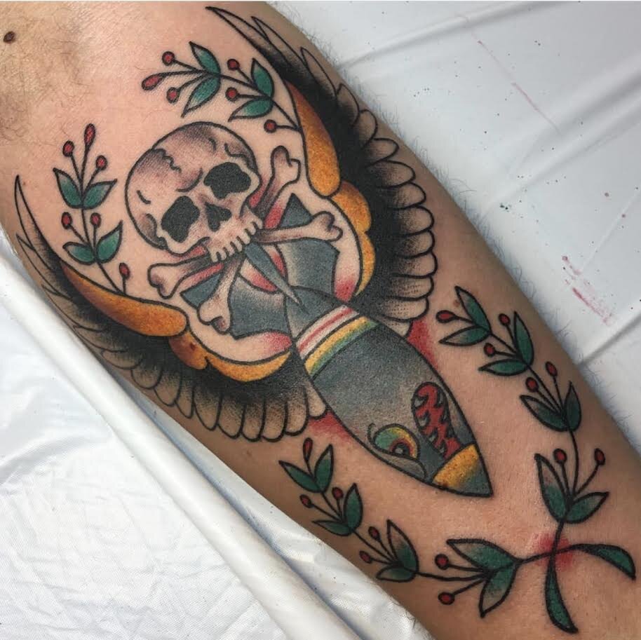 Traditional skull and crossbones tattoo with Americana design by Brian Gattis at Southern Star Tattoo in Atlanta, Georgia