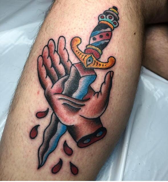 Tattoo of dagger through hand by Brian Gattis at Southern Star Tattoo in Atlanta, Georgia
