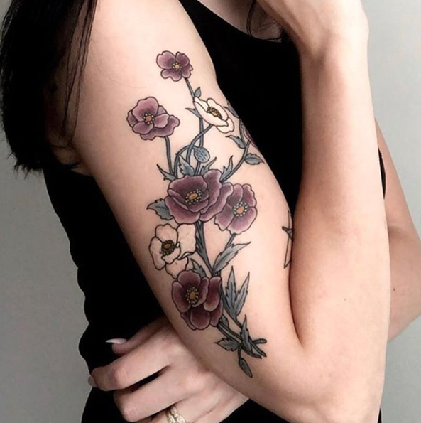 Flower tattoo on arm by Brian Gattis at Southern Star Tattoo in Atlanta, Georgia
