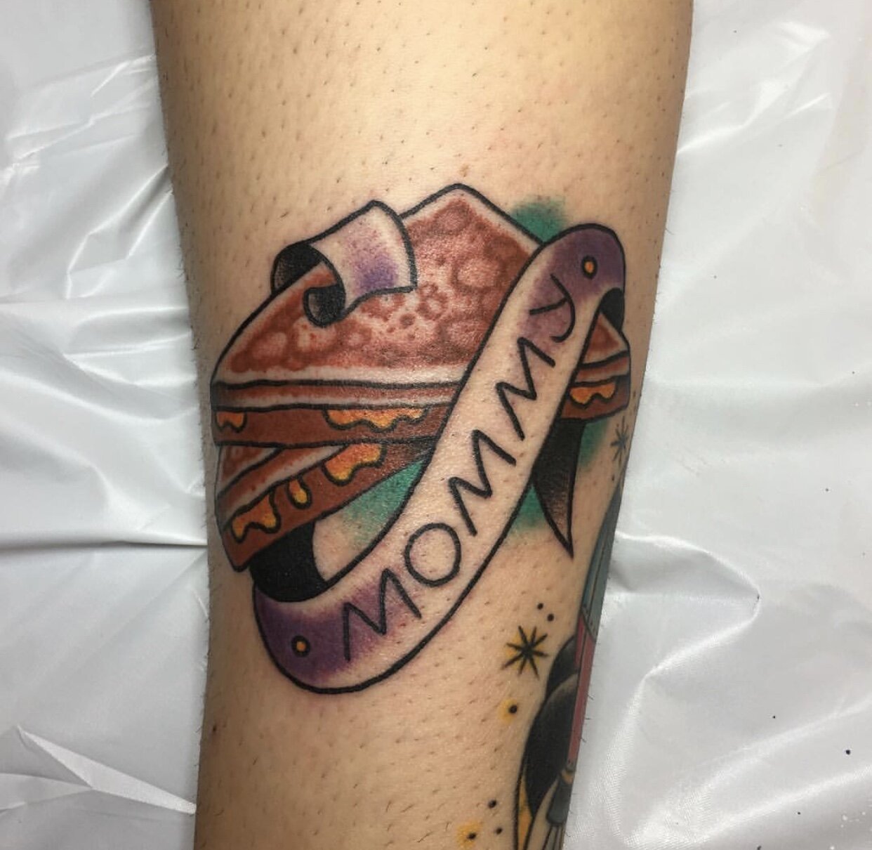 Grilled cheese tattoo with banner by Andrew Patch at Southern Star Tattoo in Atlanta, Georgia.