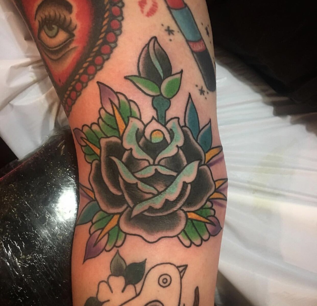 Traditional rose tattoo by Andrew Patch at Southern Star Tattoo in Atlanta, Georgia.