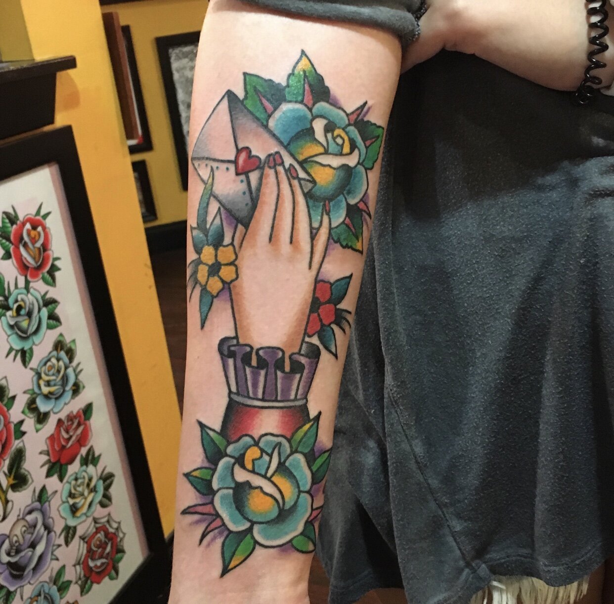 Love letter tattoo with roses by Andrew Patch at Southern Star Tattoo in Atlanta, Georgia.