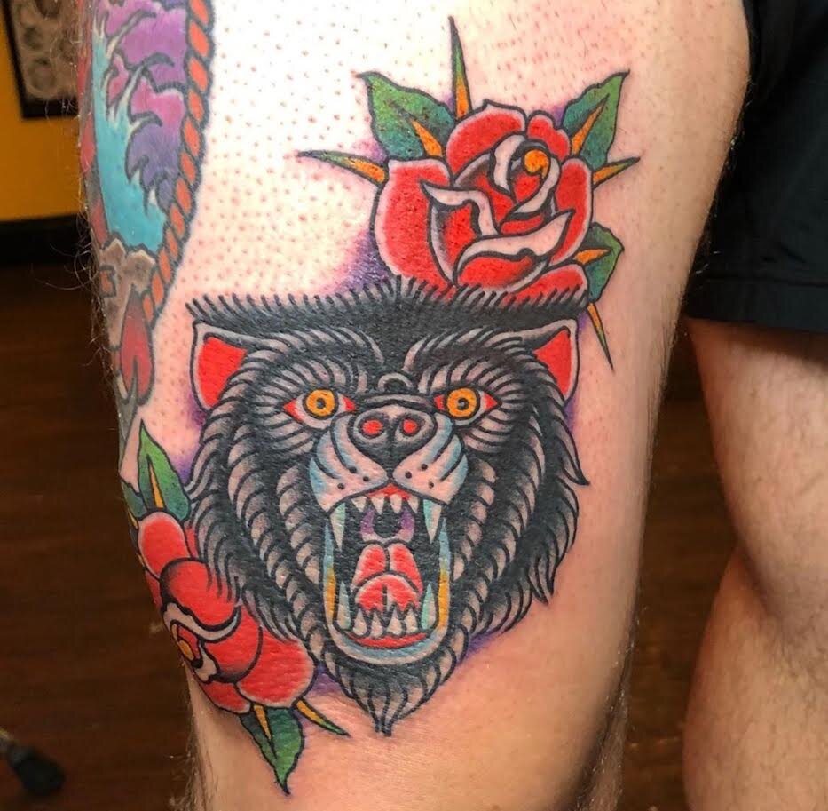 Traditional tattoo of bear head and roses in color by Andrew Patch at Southern Star Tattoo in Atlanta, Georgia.