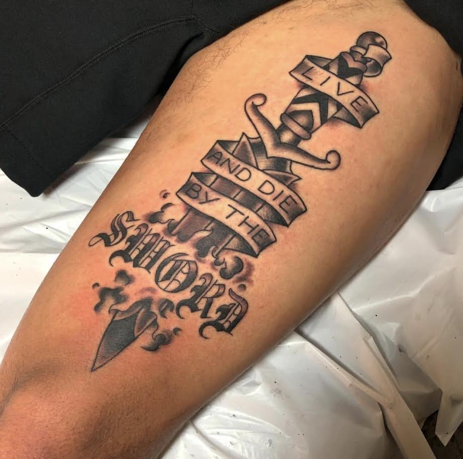 Live by the sword die by the sword tattoo by Andrew Patch at Southern Star Tattoo in Atlanta, Georgia.
