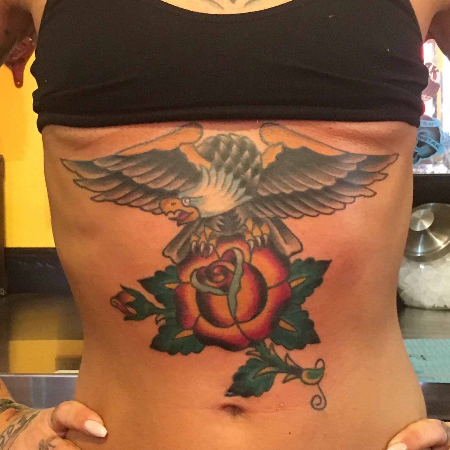 Traditional eagle tattoo on stomach by Josh Hanes at Southern Star Tattoo in Atlanta, Georgia