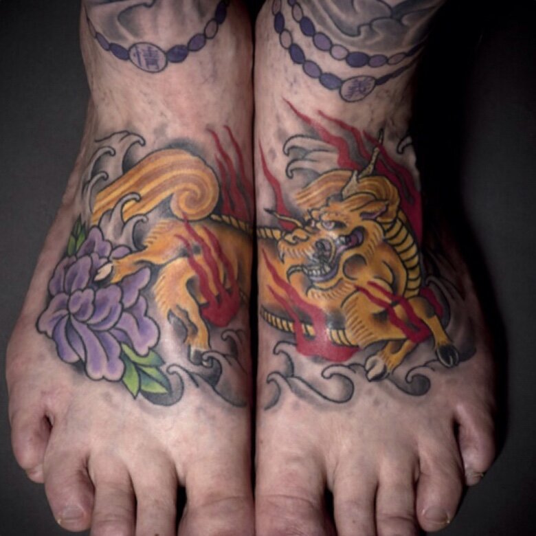 Dragon tattoo on feet by Josh Hanes at Southern Star Tattoo in Atlanta, Georgia