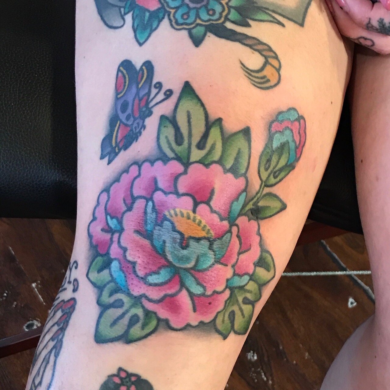 Flower tattoo in color by Josh Hanes at Southern Star Tattoo in Atlanta, Georgia