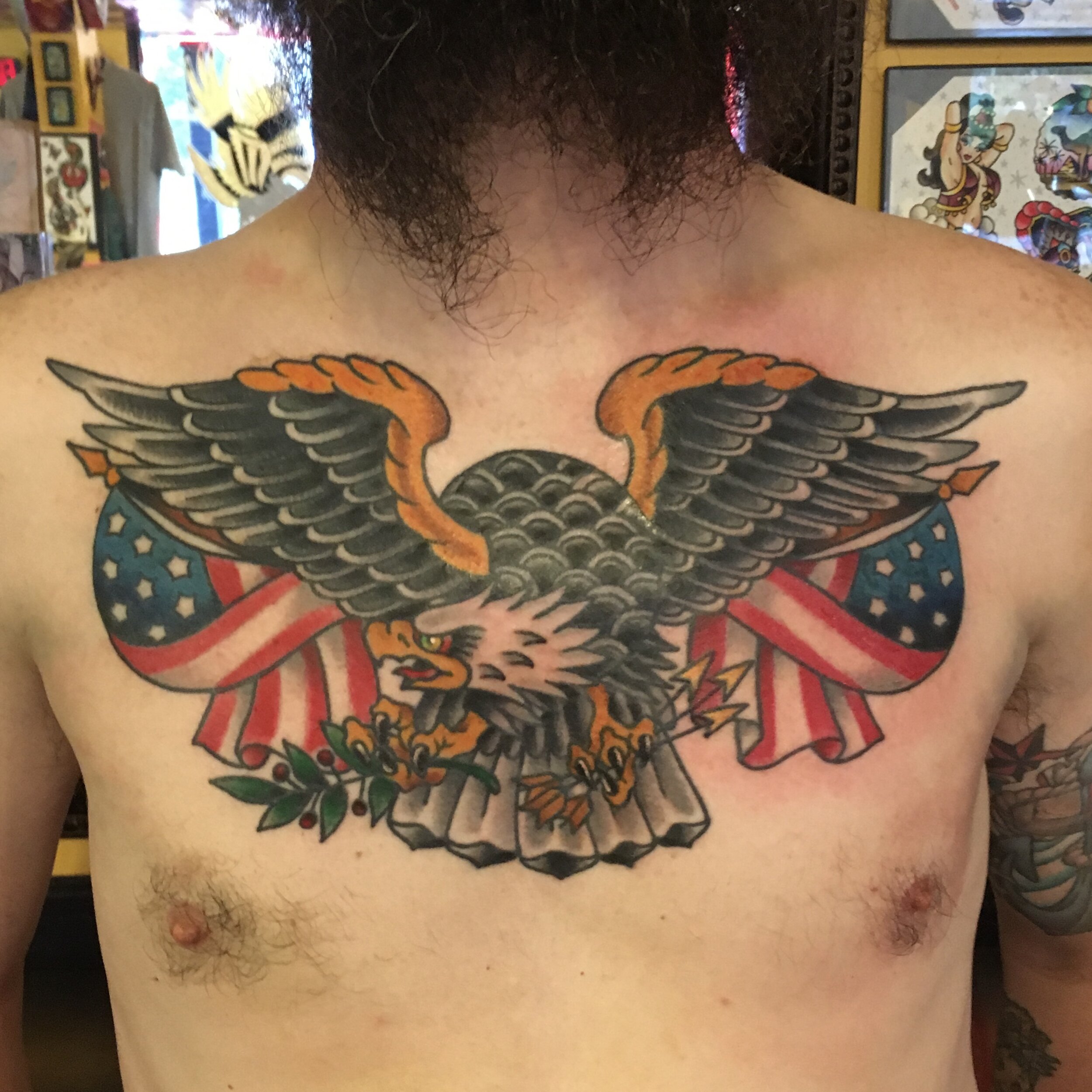Americana eagle tattoo with American flag on chest by Josh Hanes at Southern Star Tattoo in Atlanta, Georgia