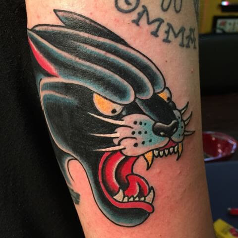 Bold traditional panther head tattoo by Bill Conner at Southern Star Tattoo in Atlanta, Georgia