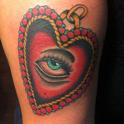 Heart and eye locket tattoo in traditional color by Bill Conner at Southern Star Tattoo in Atlanta, Georgia