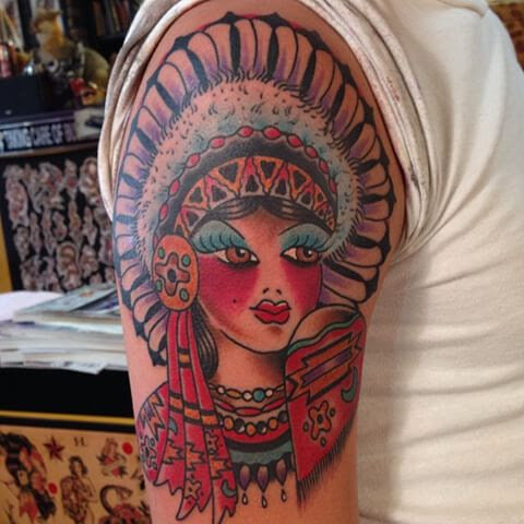 Woman with headdress tattoo in bold color by Bill Conner at Southern Star Tattoo in Atlanta, Georgia