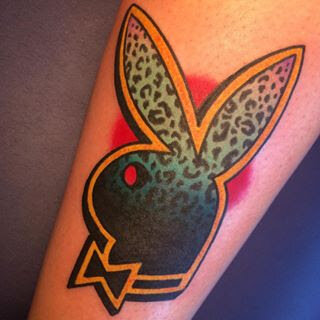 Cheetah Playboy tattoo by Demian Bouchan at Southern Star Tattoo in Atlanta, Georgia